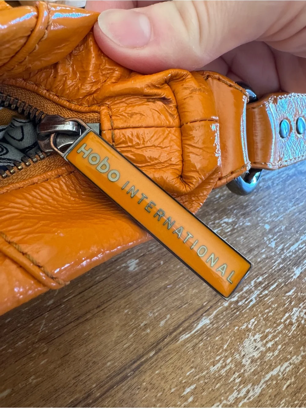 Bright orange HOBO bag